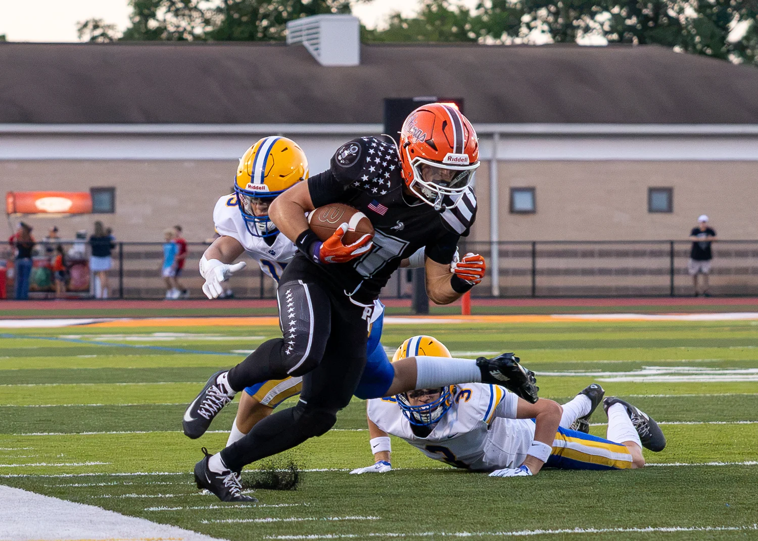 Ball Carrier looking to break free from the defense