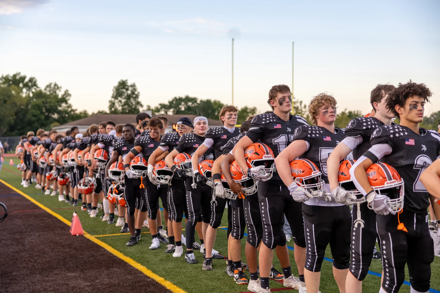 Team Standing for the National Anthem